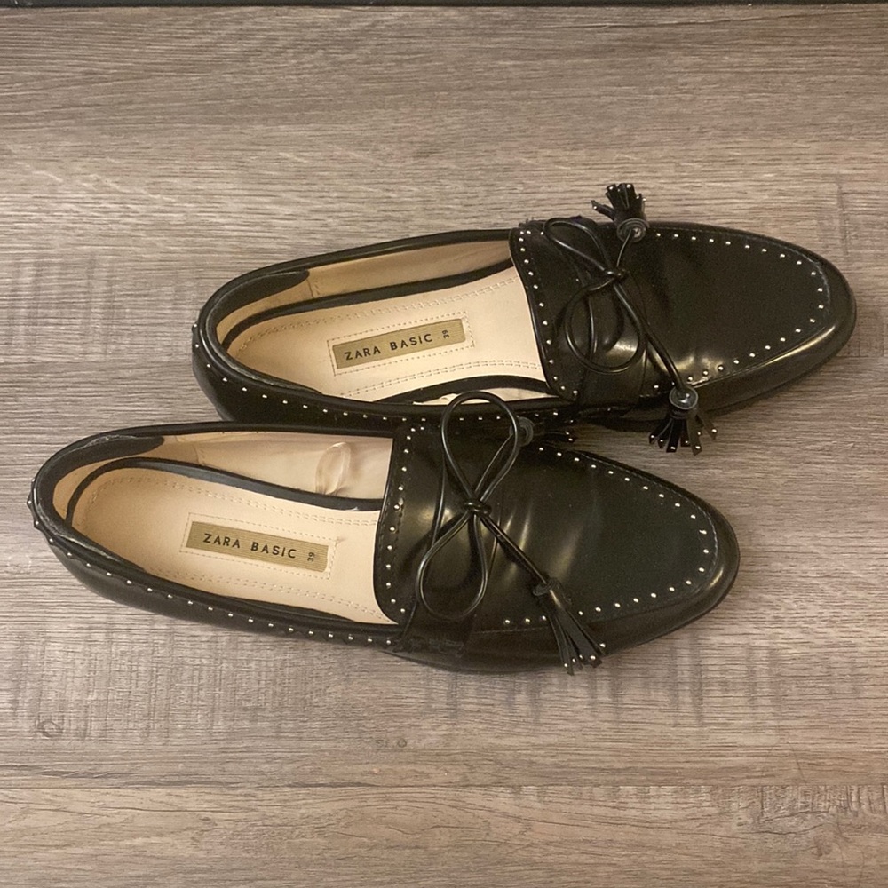 Black flat loafers